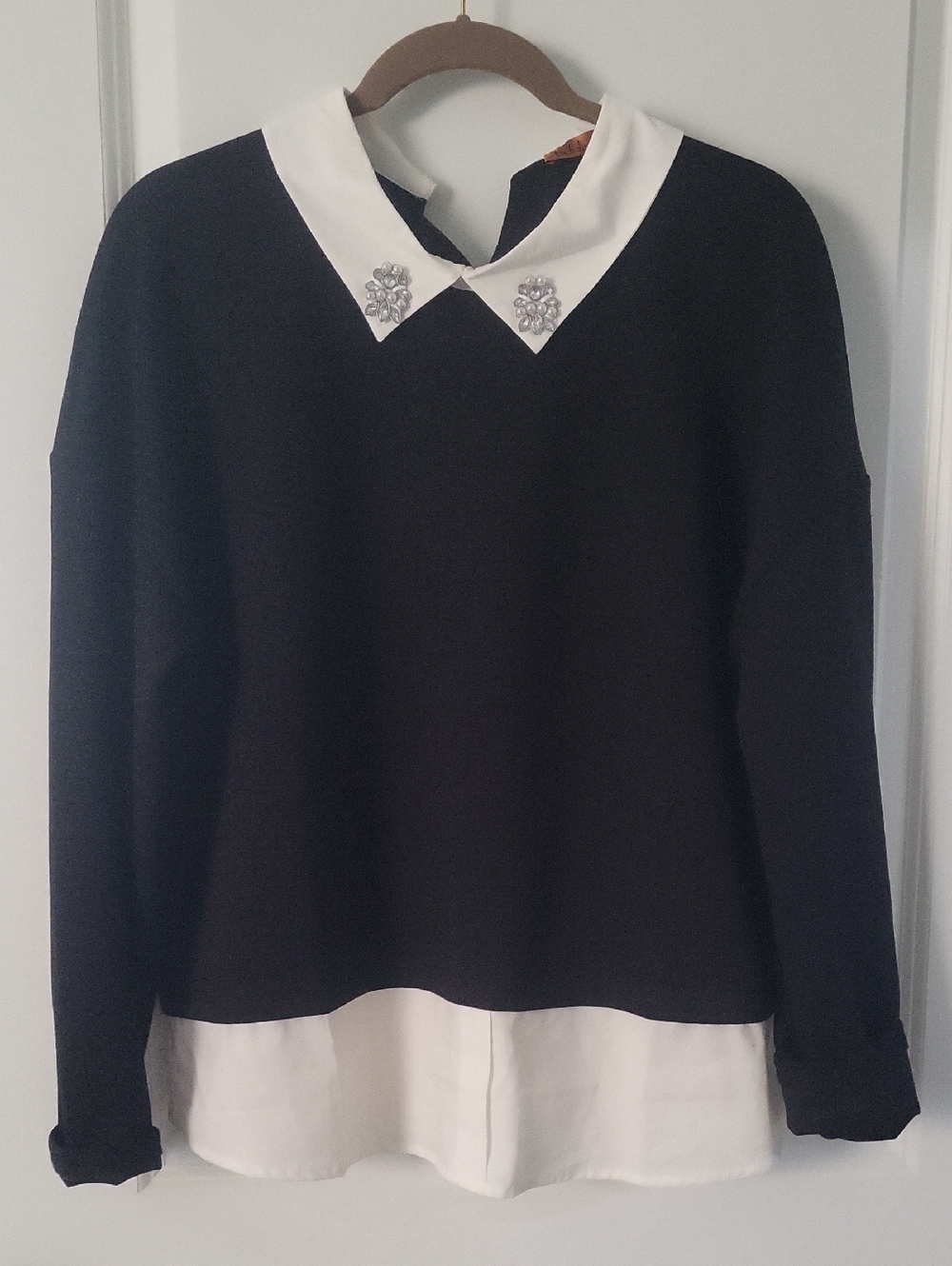 Black Sweater with White Collared Shirt Detail